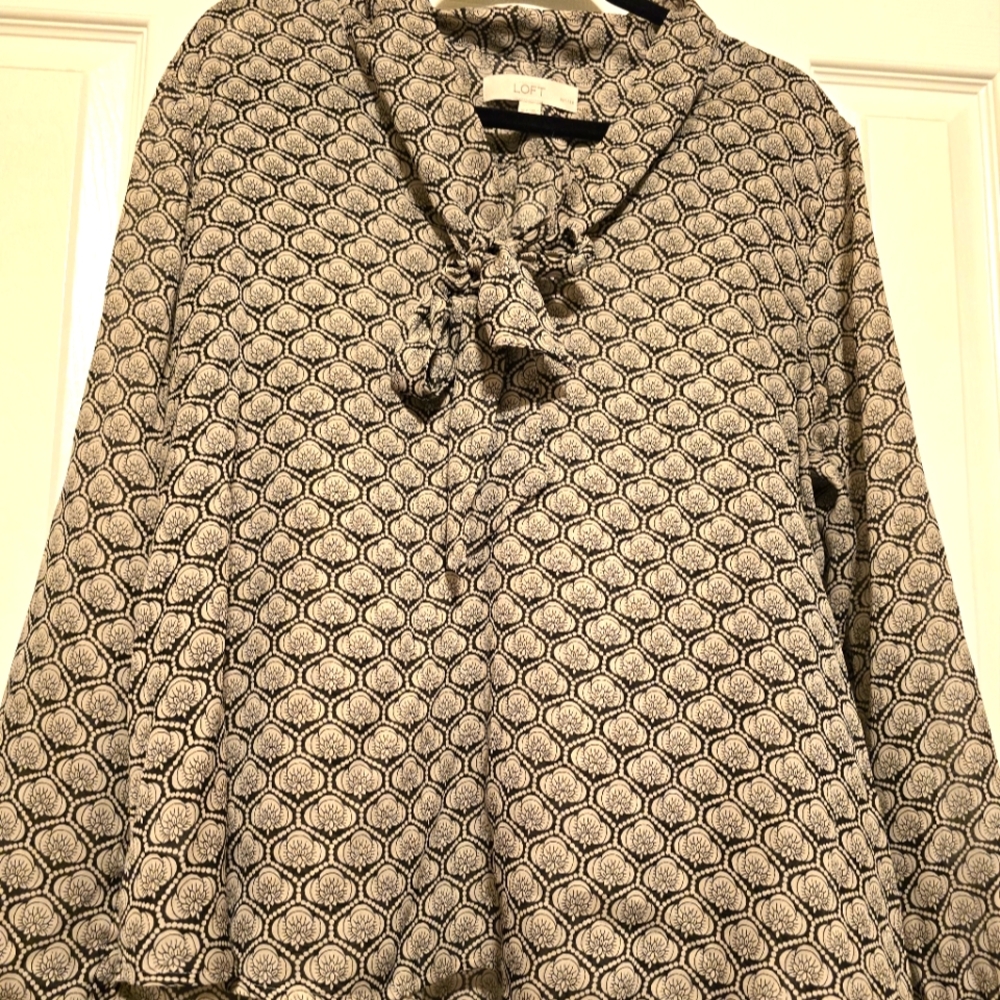 Used Loft long-sleeves tan colored tops with print designs in black.  Size XLP